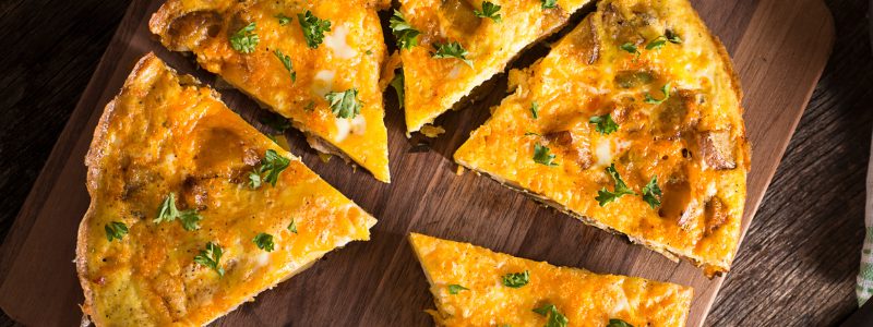 Cheese free frittata on a wooden platter