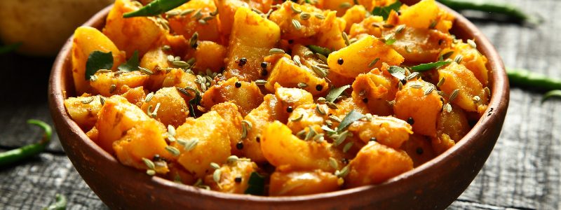 Potato curry with spices and herbs